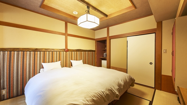 ８畳和室にベッドの寛ぎ　和風ツイン客室「朴」